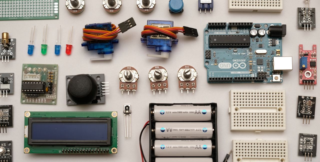 Photo of electronics components laid out in a table.